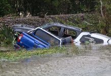 PM praises “community driven response” to worst weather storm this century.