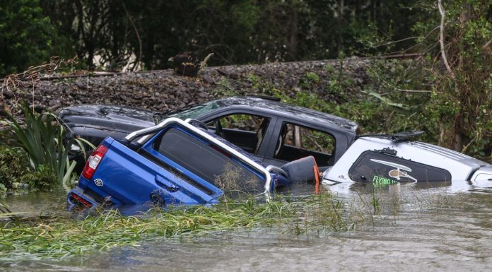 PM praises “community driven response” to worst weather storm this century.